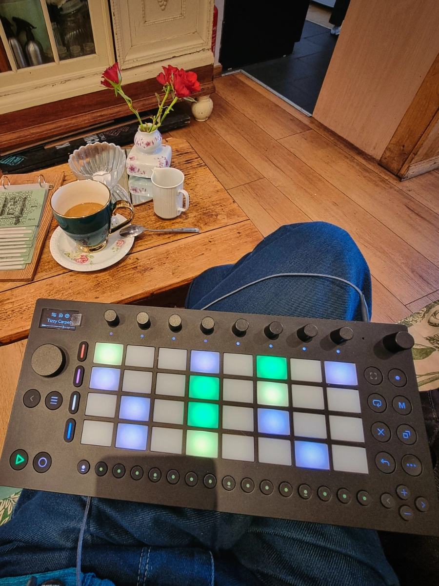 Ableton Move on a lap, coffee and red roses in the background